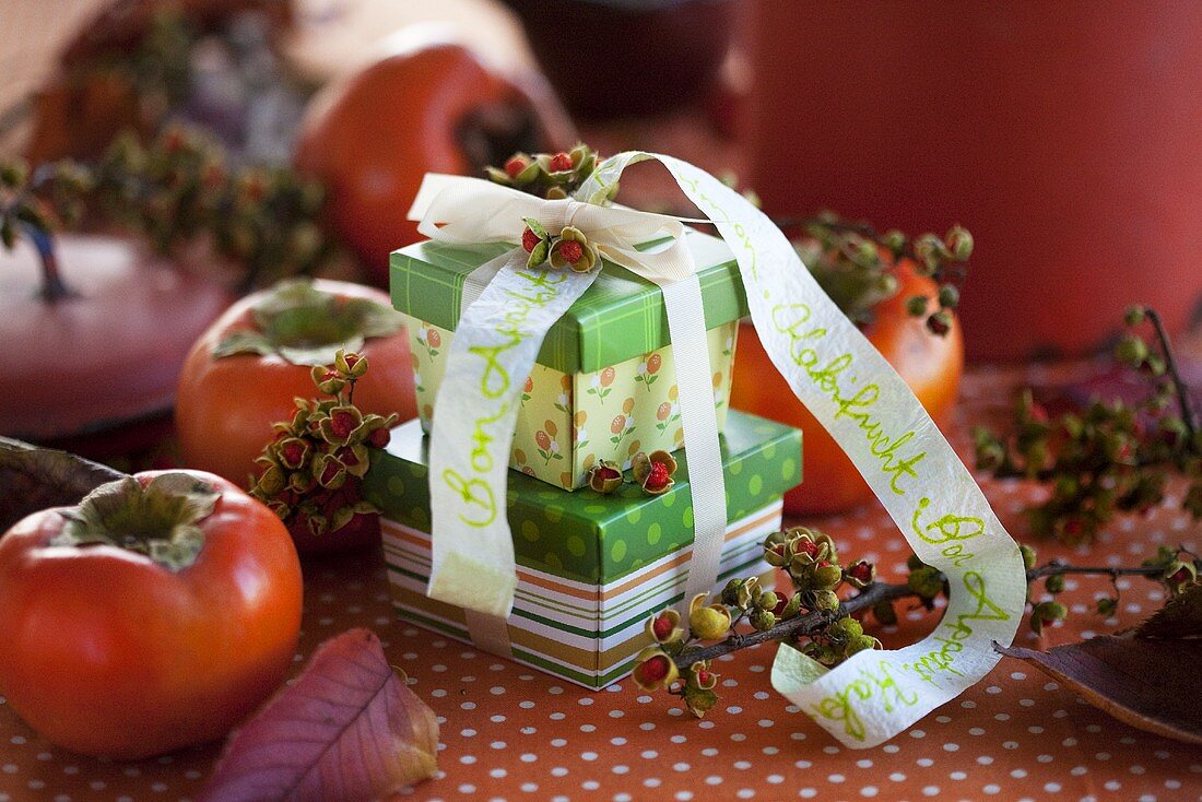Gift wrapped boxes with Japanese persimmons