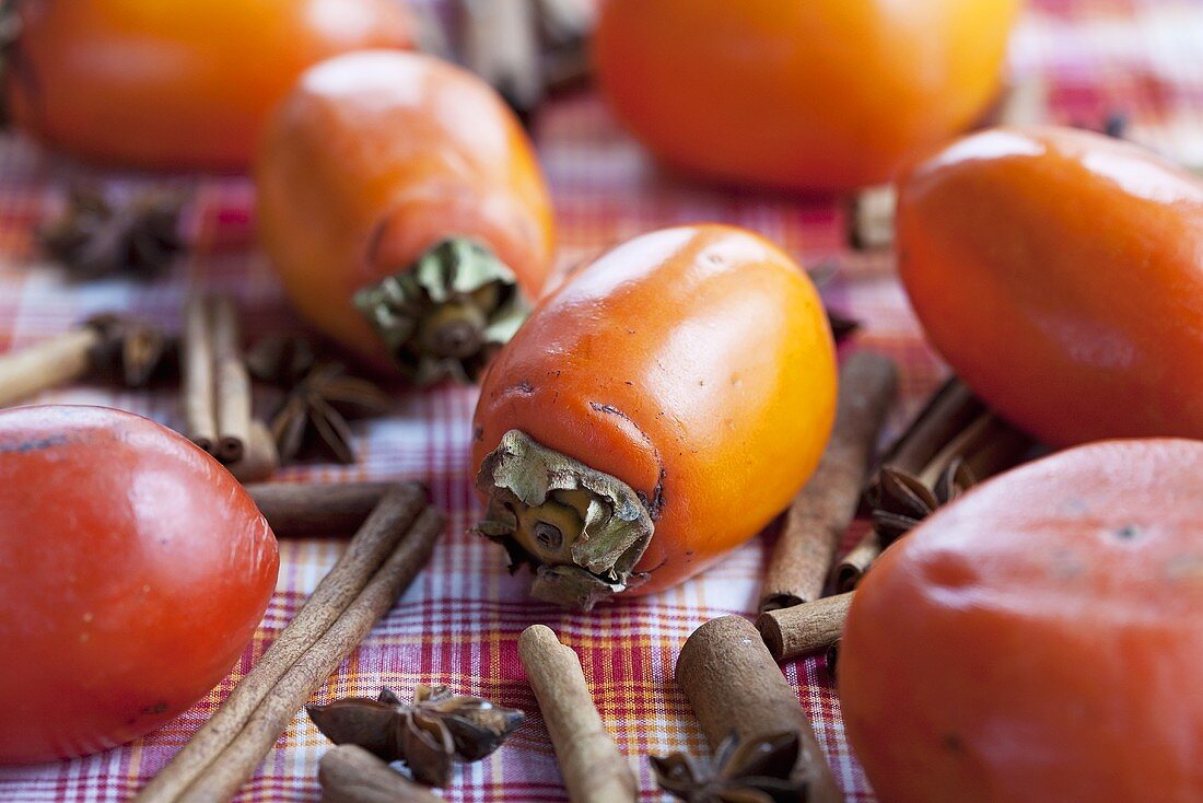 Japanese persimmons, cinnamon sticks and star anise