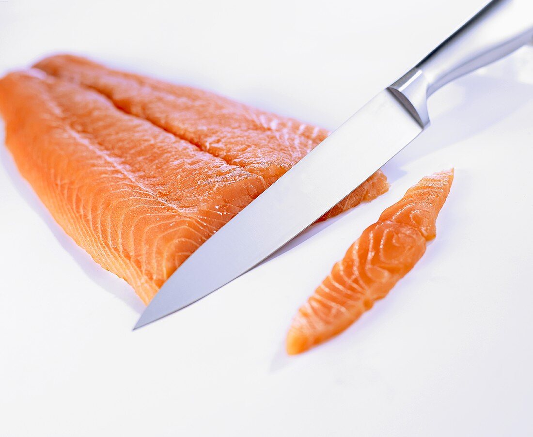 Salmon with filleting knife