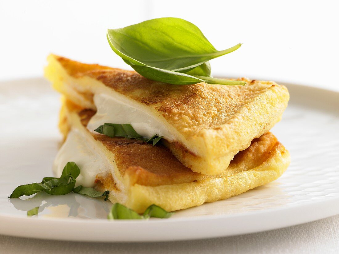 Mozzarella in carozza (fried cheesy bread, Italy)