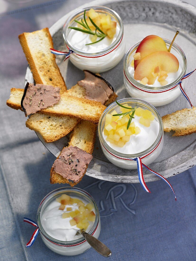 Goat's cheese cream with apple compote and toast with liver pâté