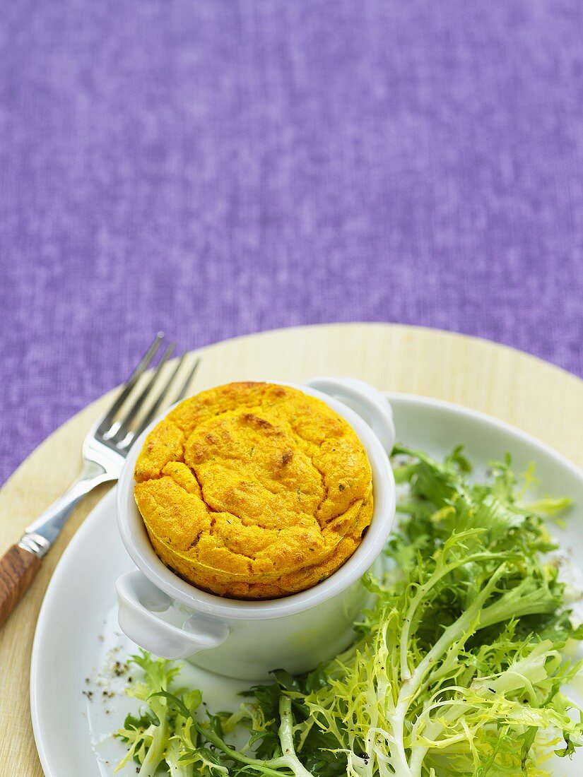 Cheese souffle with frisee lettuce