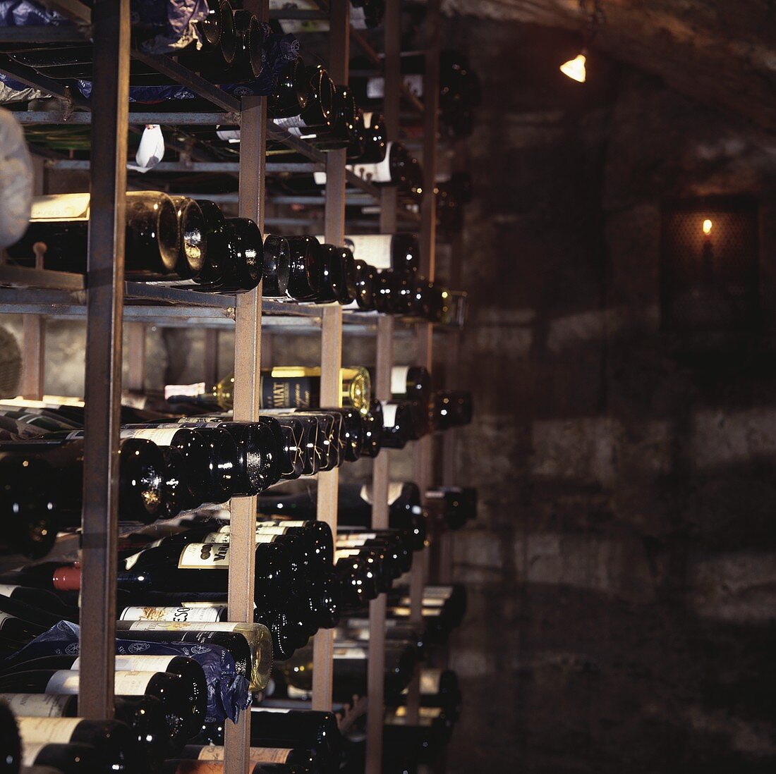 Several wine bottles in a rack