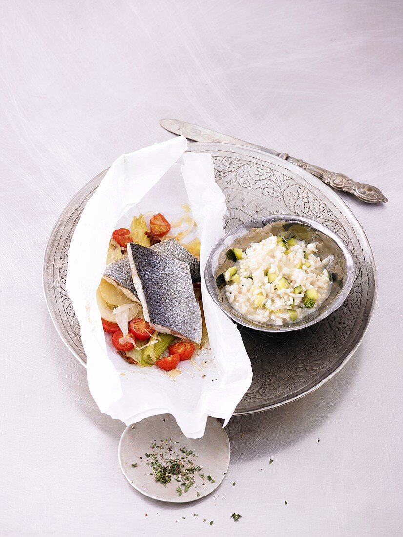 Sea bass and vegetables en papillote with courgette risotto