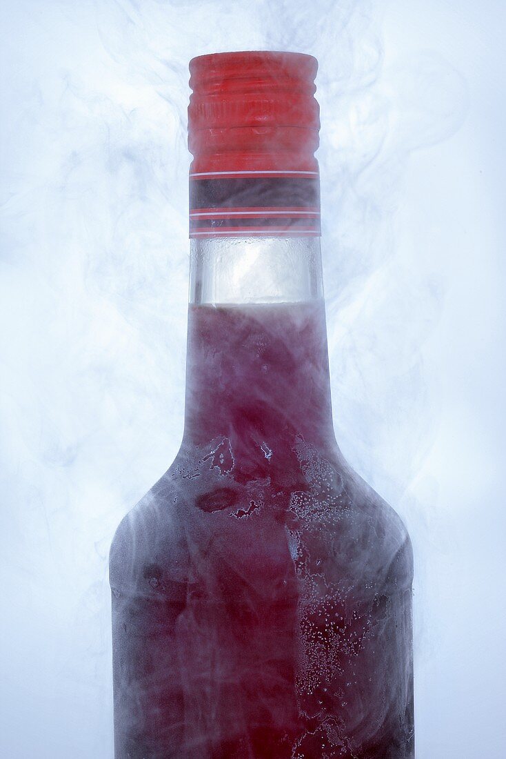 Amaro herbal liqueur in icy bottle
