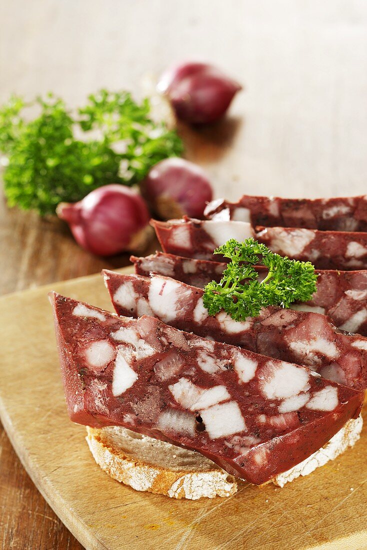 Black pudding and parsley on bread