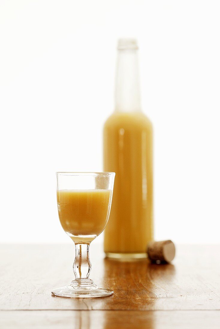 Advocaat in glass and bottle