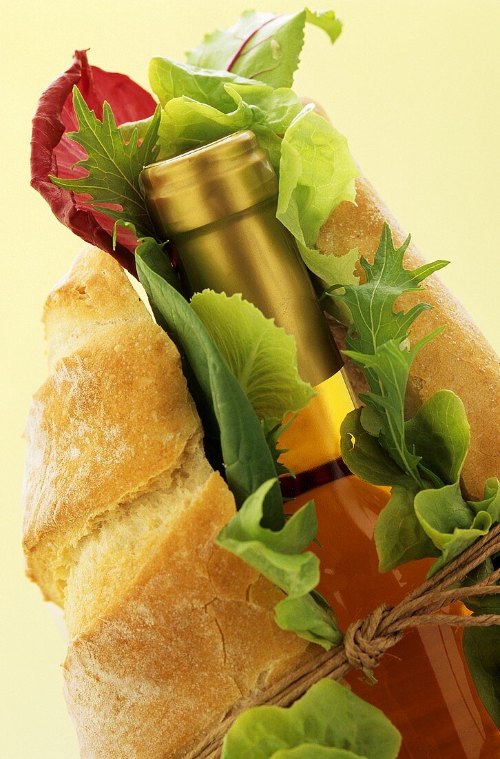 Bottle of wine in baguette