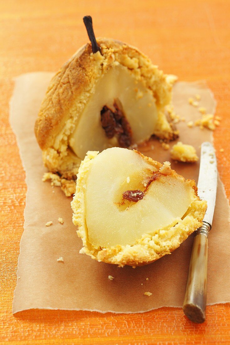 Pear baked in pastry with raisin and cinnamon stuffing