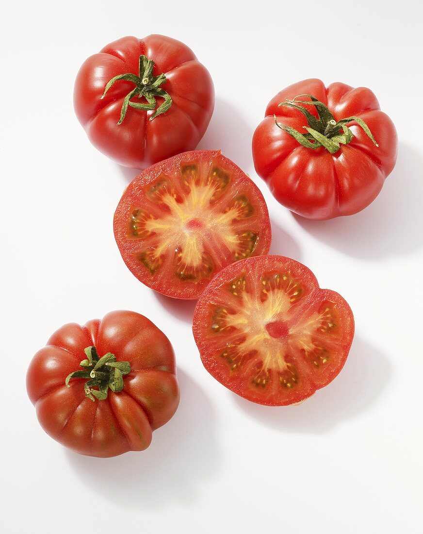 Oxheart tomatoes, whole and halved