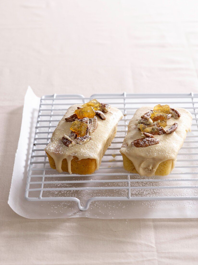 Small iced cakes with ginger, nuts and cinnamon