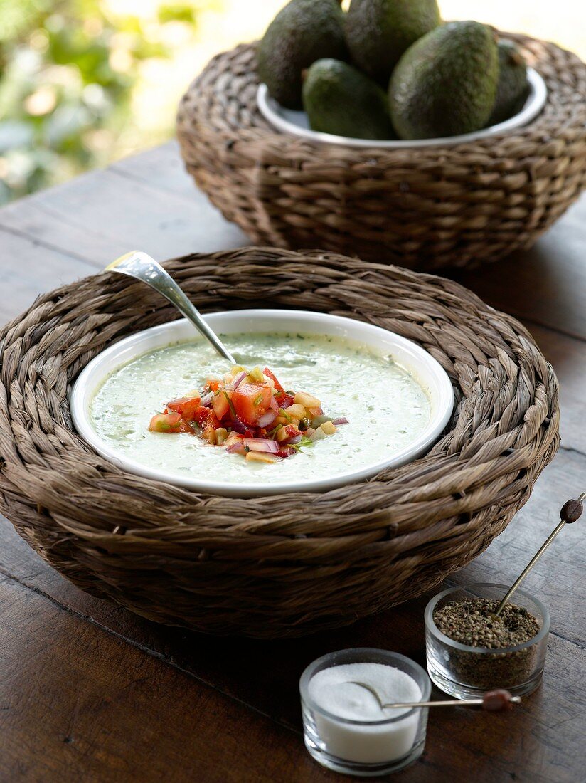 Cucumber and avocado soup with chilli tomato salsa