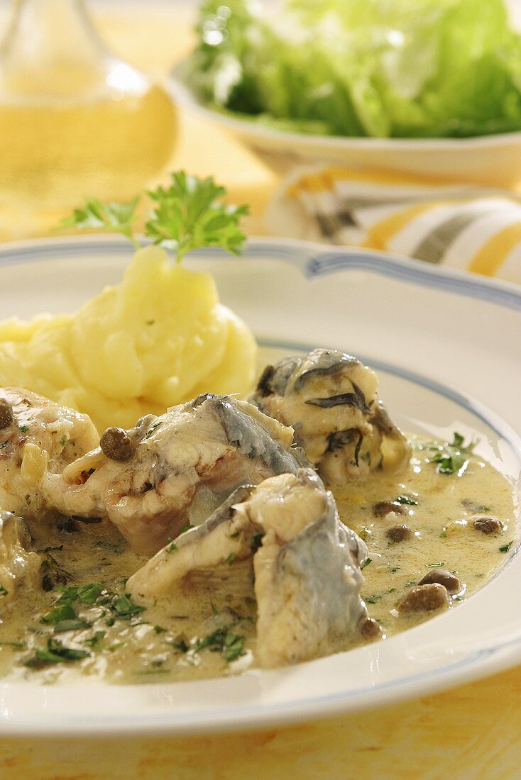 Eel with caper sauce and mashed potato