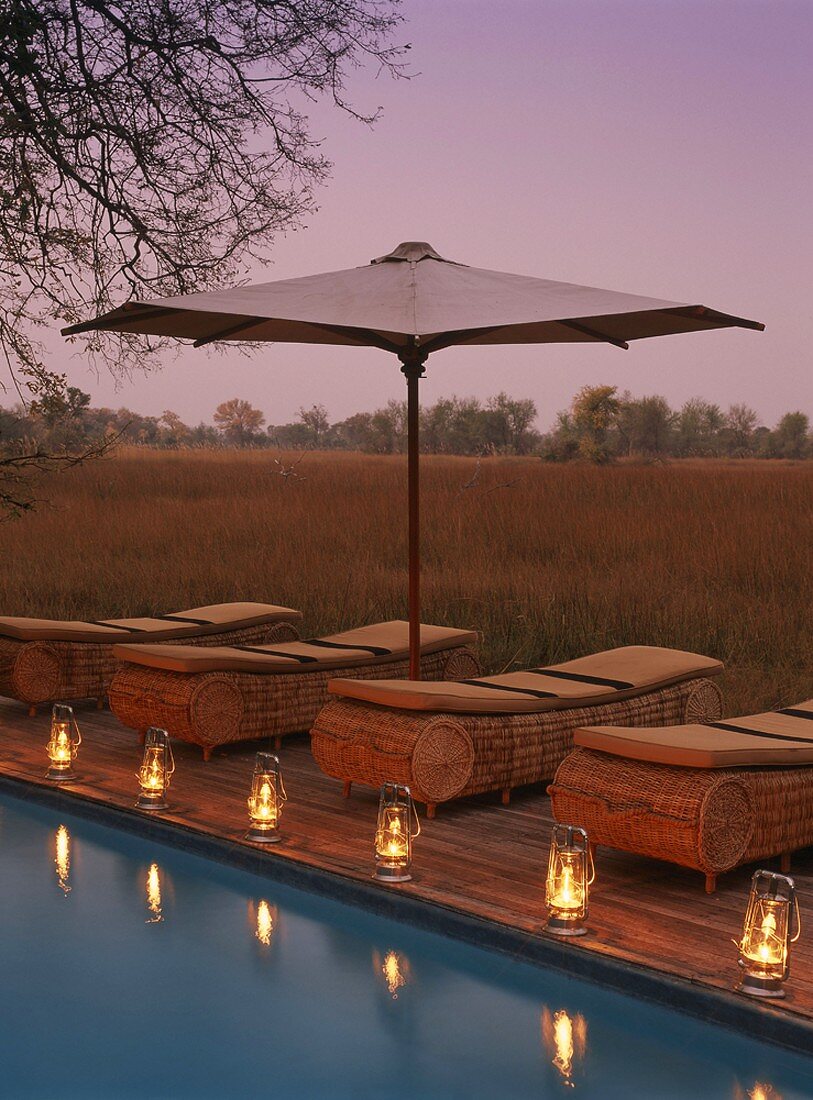 Loungers by a pool (at evening)