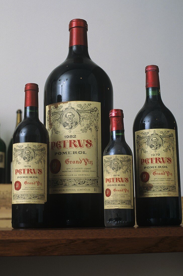 Four bottles of Château Pétrus (luxury wine), France