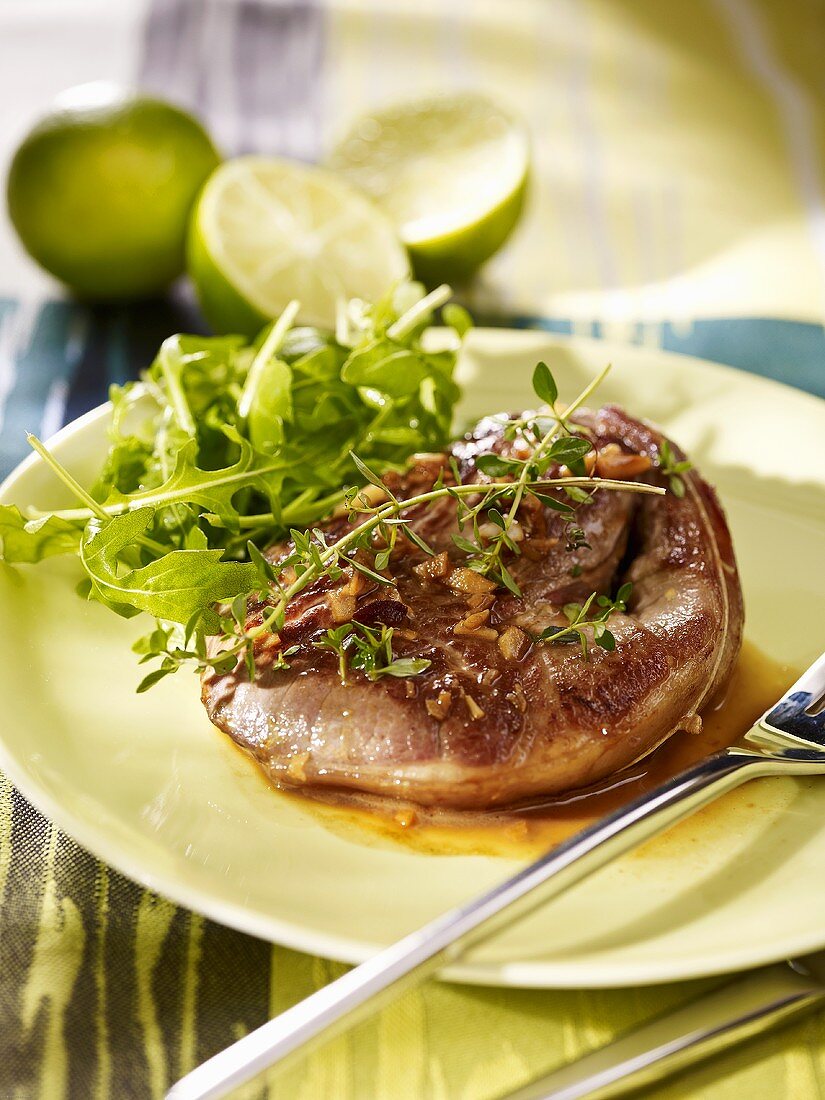 Lamb steak with herbs and rocket