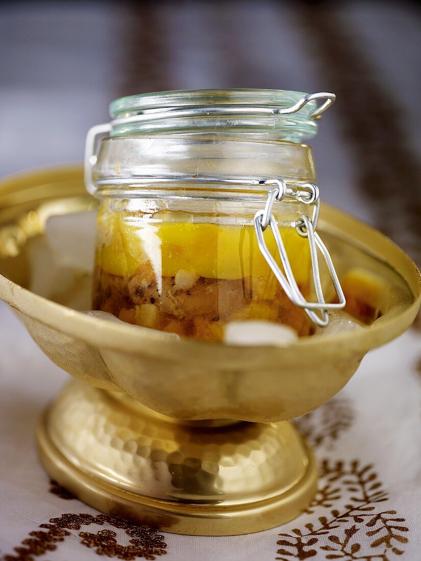 Foie gras with apricots in a preserving glass