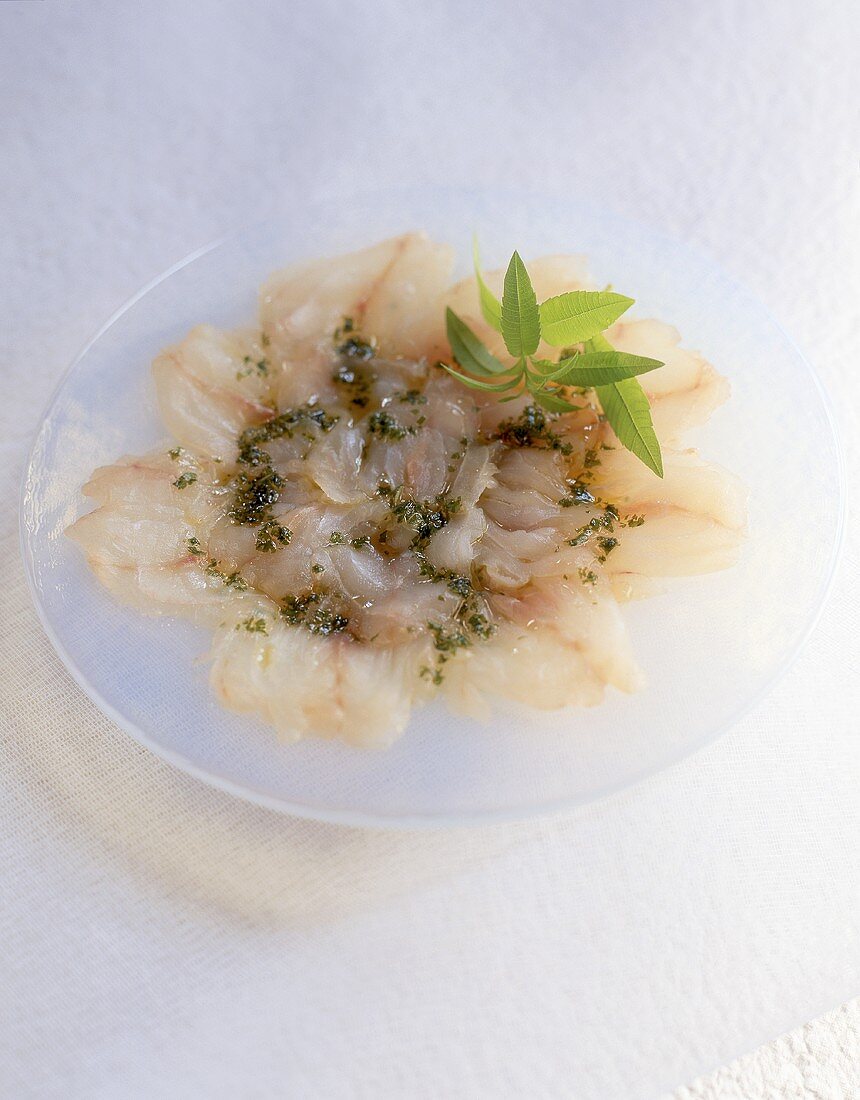 Bass carpaccio with prawns and squid