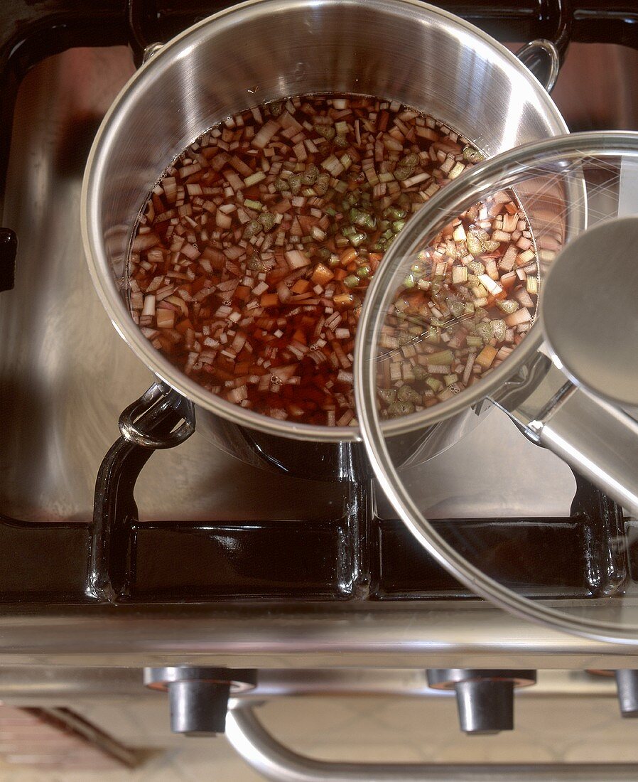 Shallot and carrot sauce being prepared