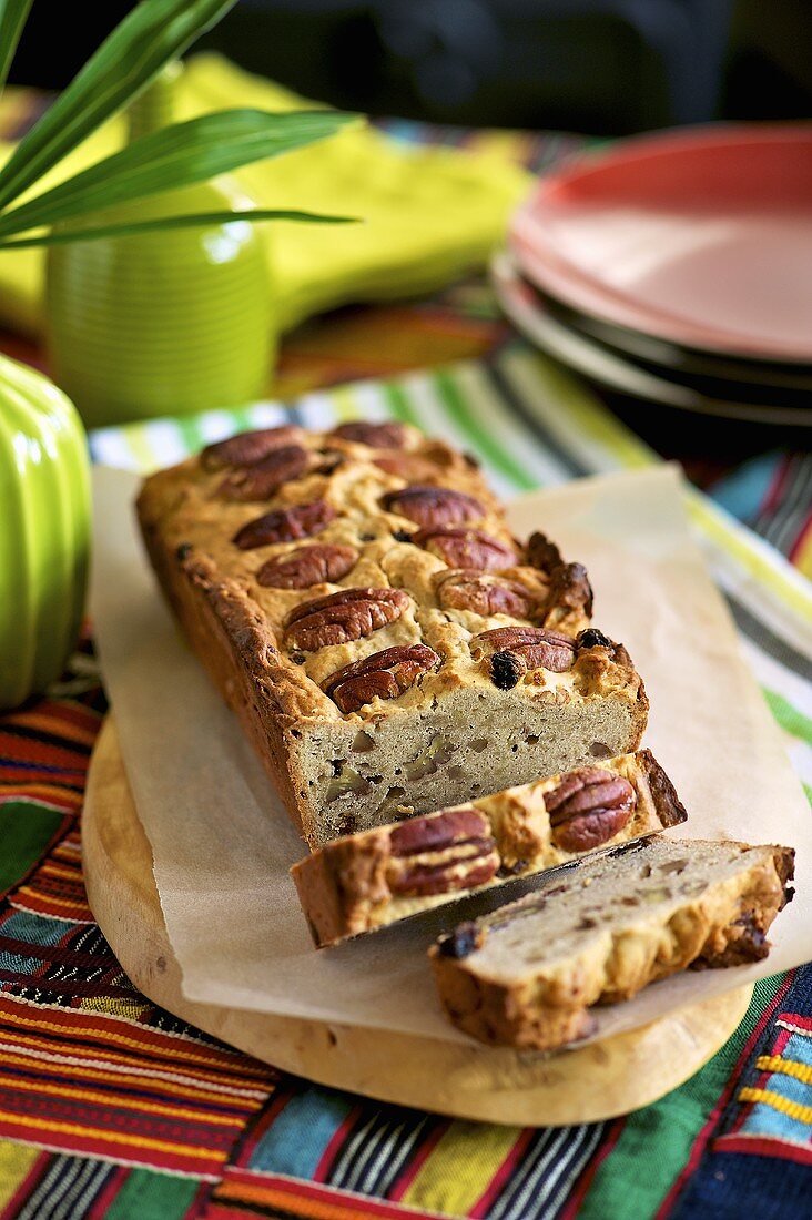 Banana and pecan bread, partly sliced