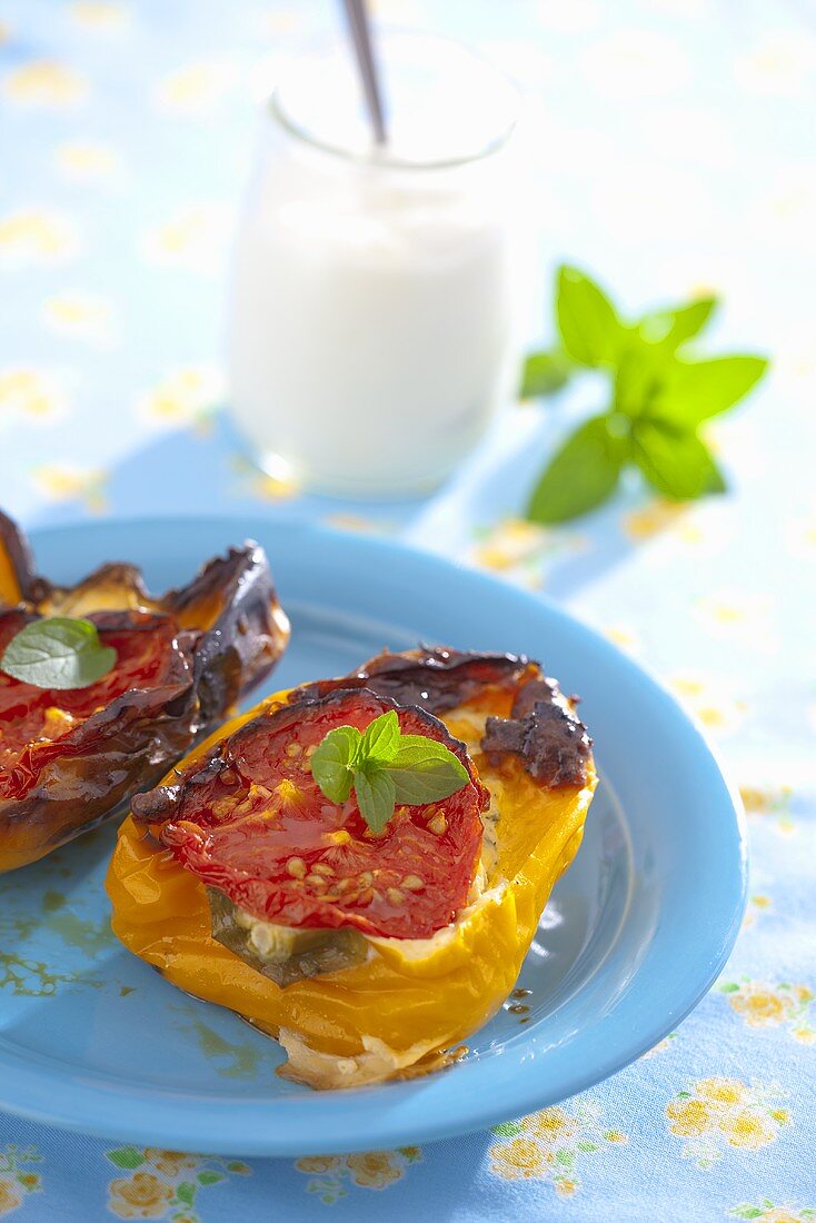 Baked peppers filled with herb quark and tomatoes