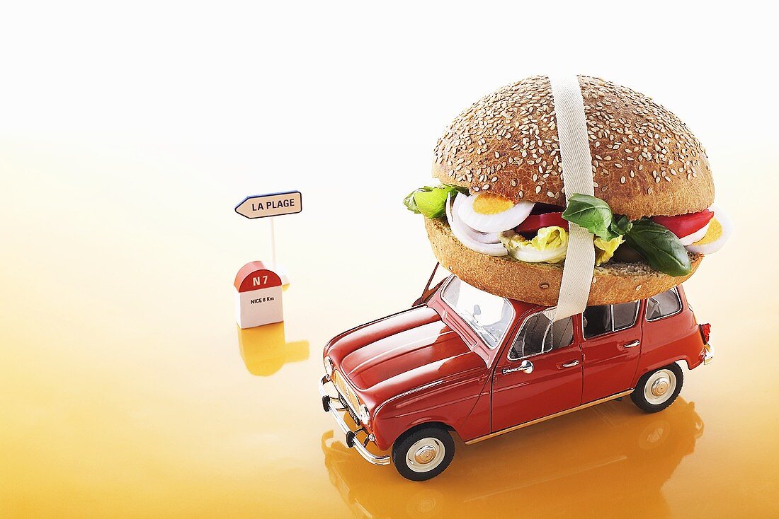 Pan bagnat (egg salad sandwich from Nice) on toy car