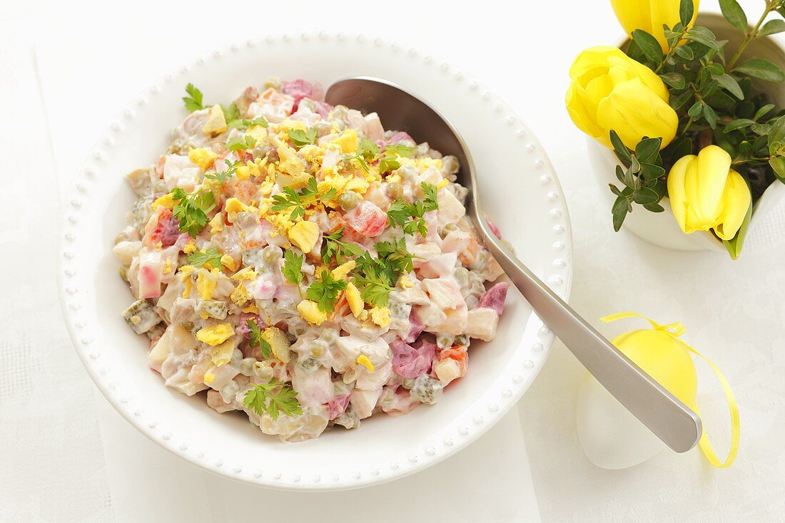 Vegetable salad with beetroot, gherkins, eggs and mayonnaise