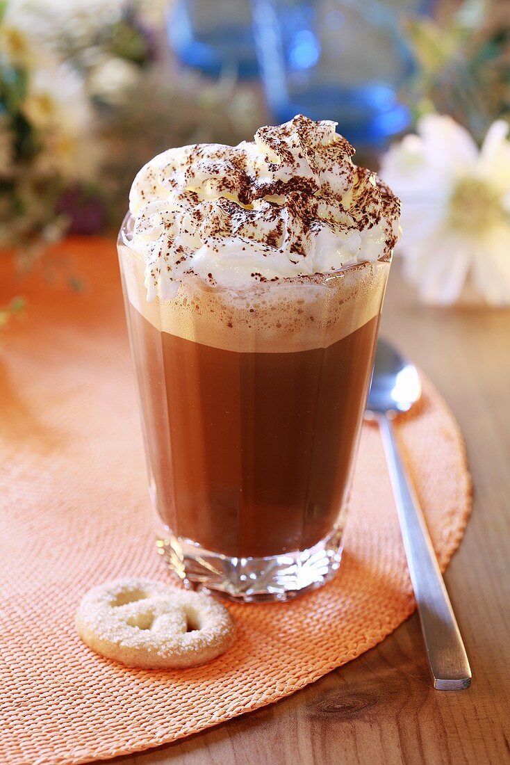 Eiskaffee (iced coffee drink) with cream topping