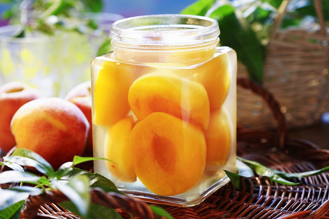 Peach compote in screw-top jar