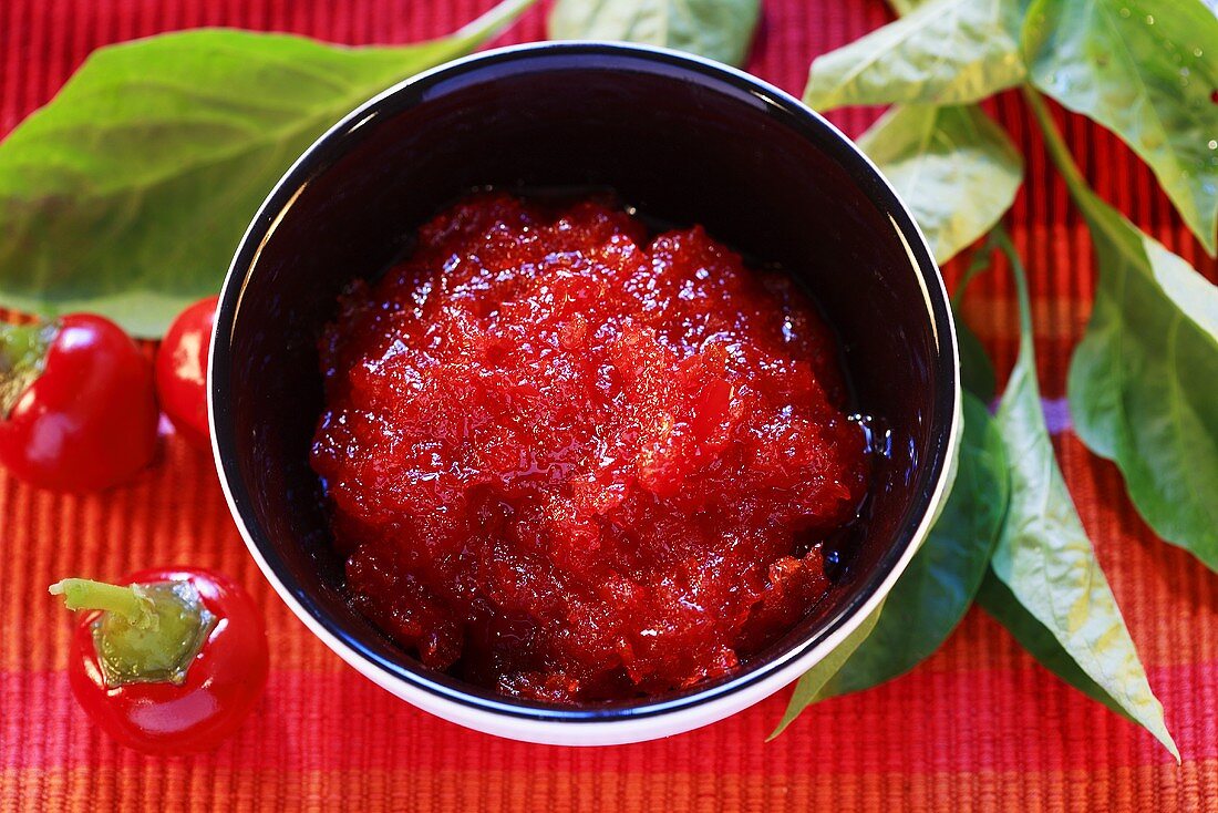 Red pepper jam in small bowl
