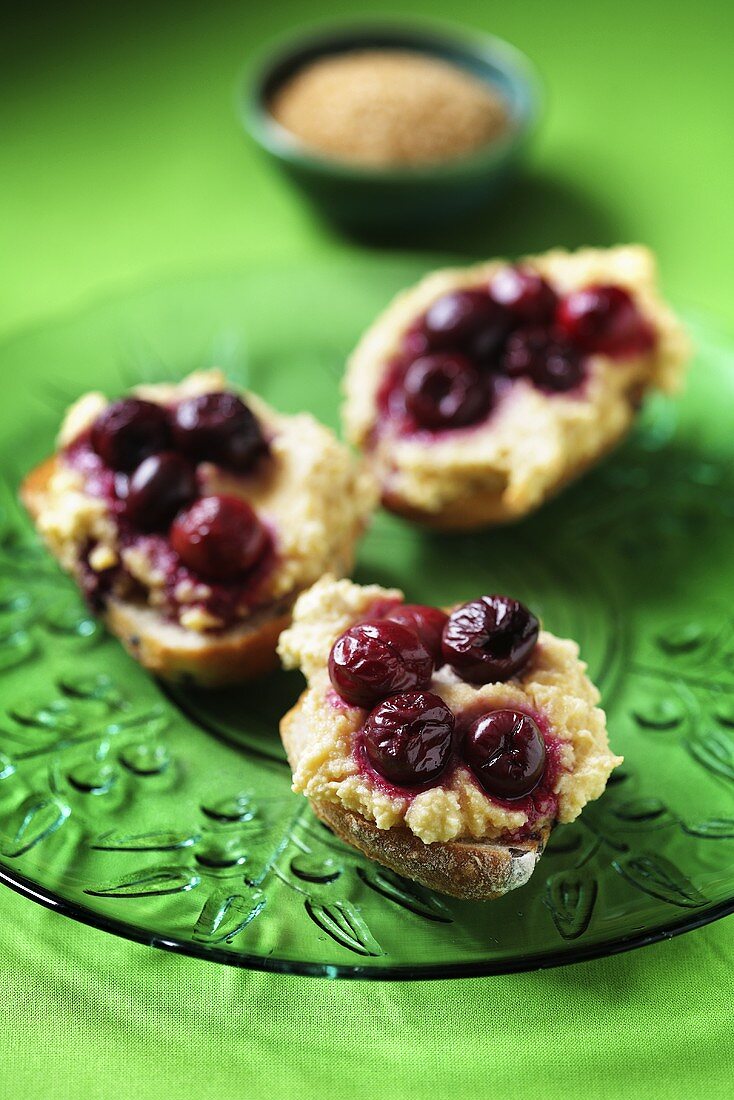 Marzipan and cherries on bread