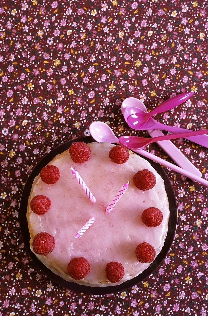 Birthday cake with raspberries