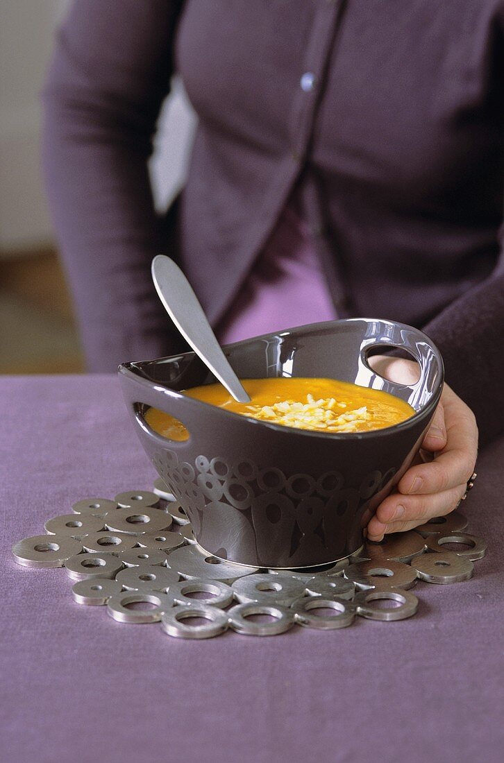 Cream of pumpkin soup with grated Comté cheese