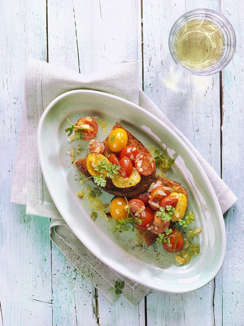 Bruschetta with red and yellow tomatoes