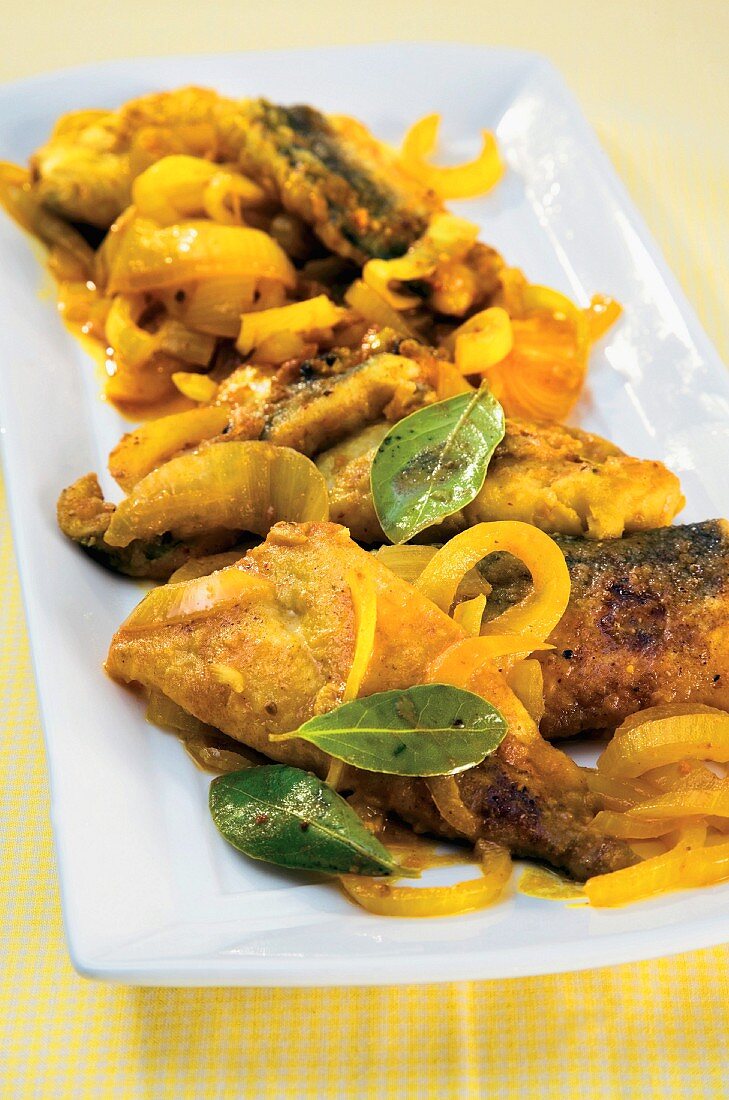 Fish in curry marinade (India and South Africa)