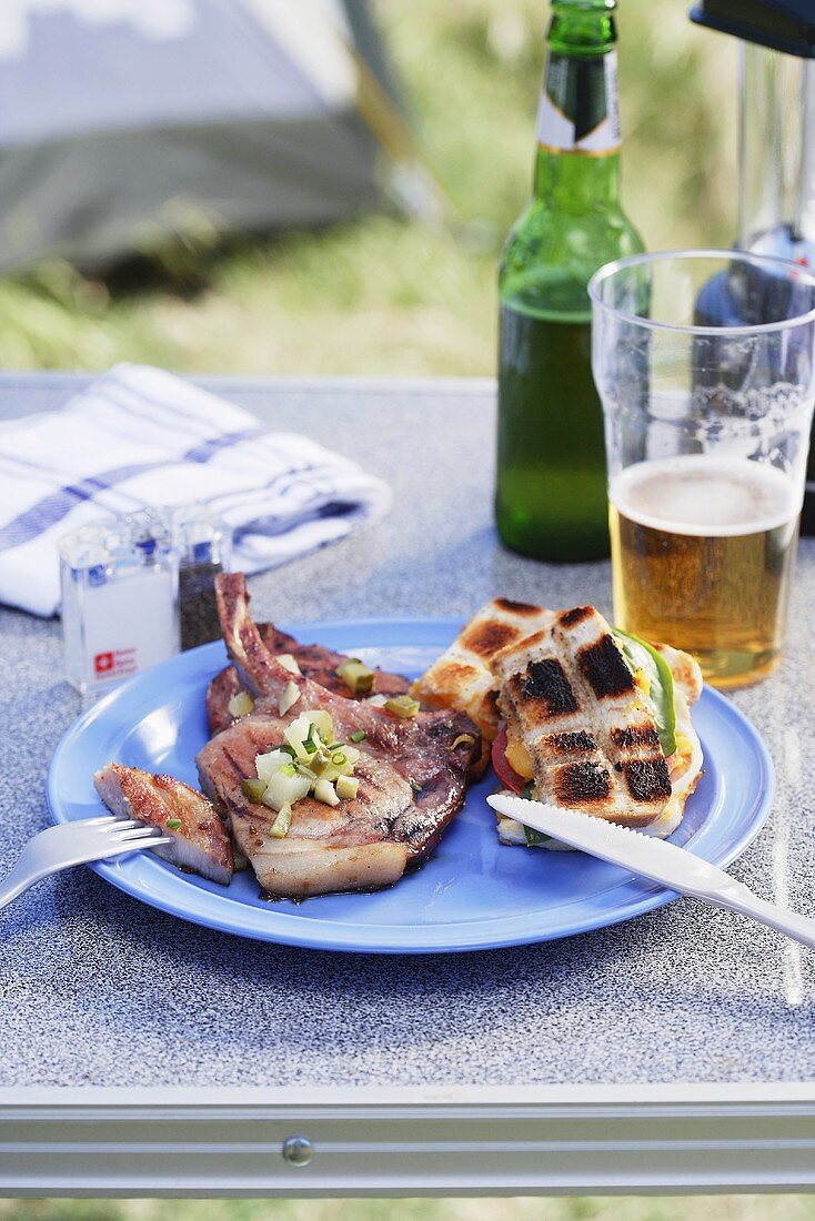 Pork chops, grilled bread and beer
