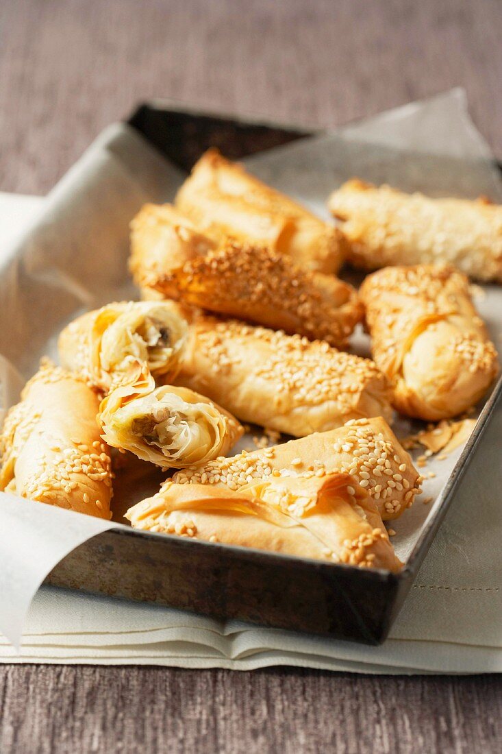 Sesame pastries with mushroom and leek filling