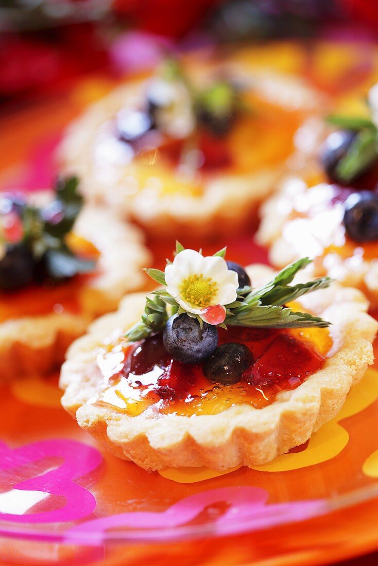 Fruit tart with strawberry flower