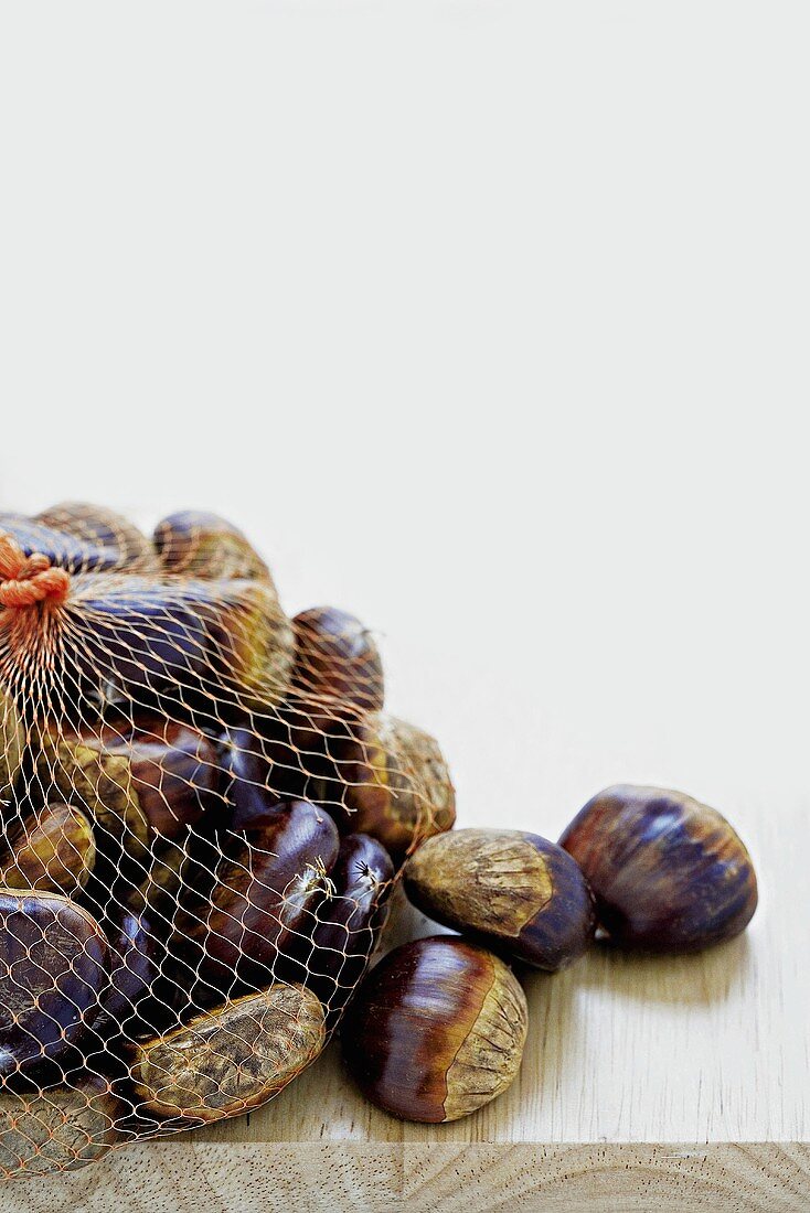 Sweet chestnuts in net