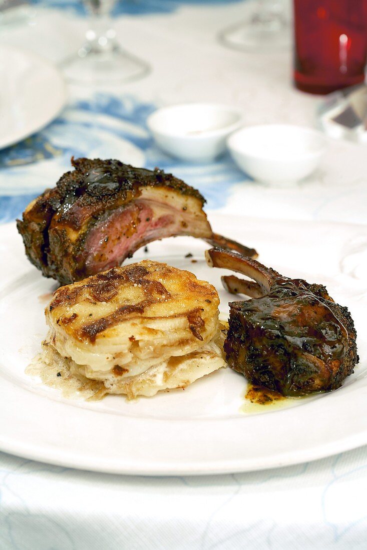 Lamb chops with mustard mint sauce and potato gratin