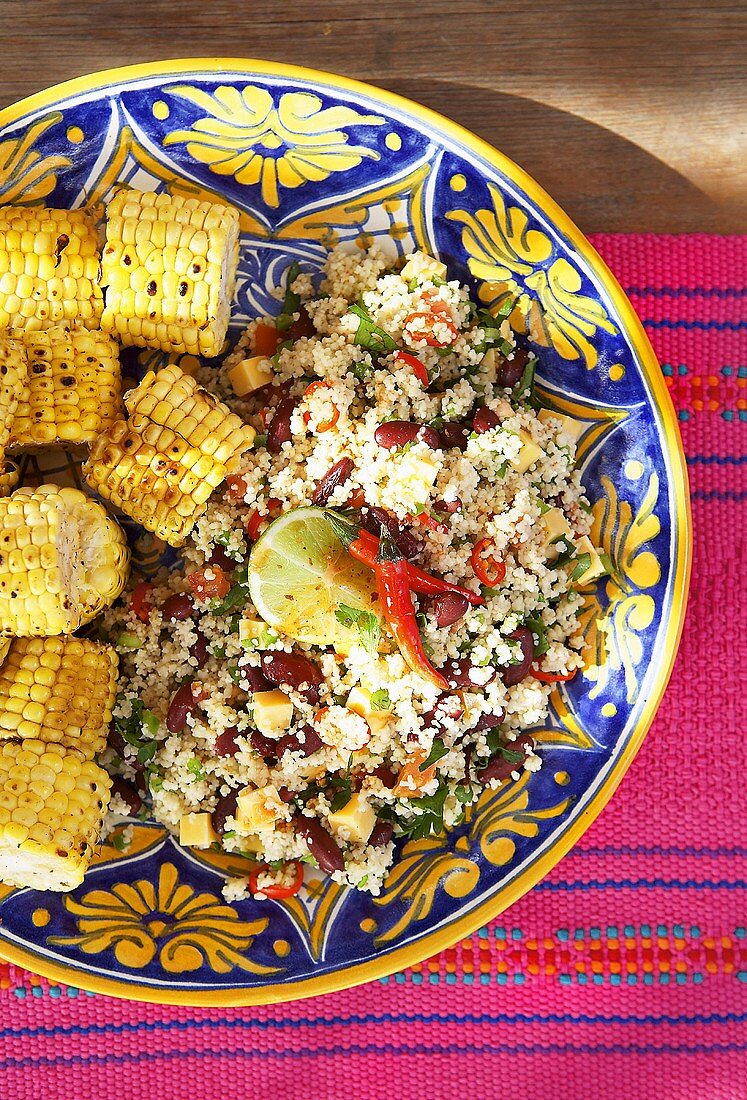Couscous salad with red kidney beans & Cheddar cheese, corn on the cob