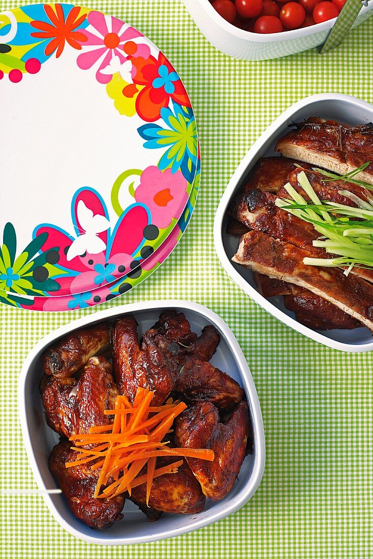 Barbecued chicken wings and spare ribs