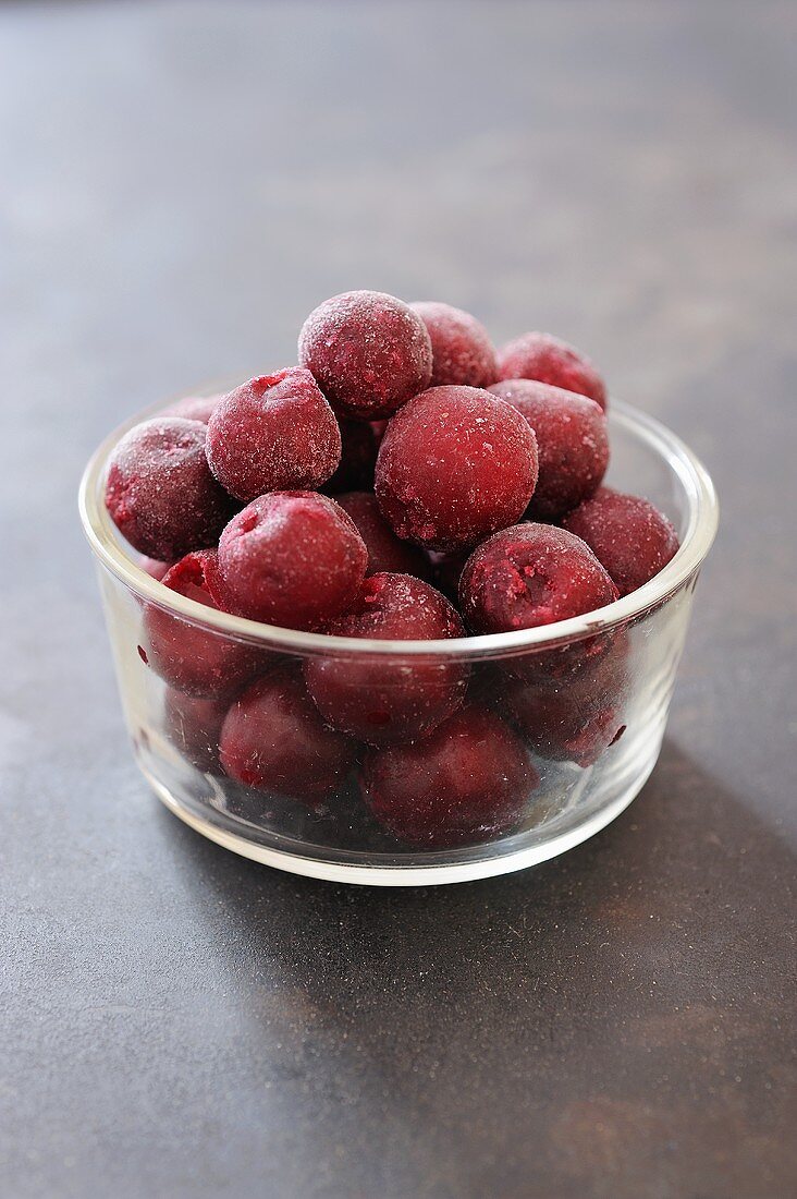 Frozen cherries in glass dish