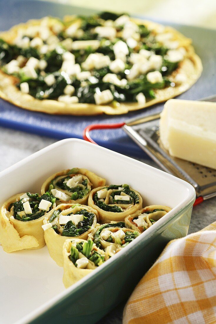 Pancake rolls with spinach and cheese filling