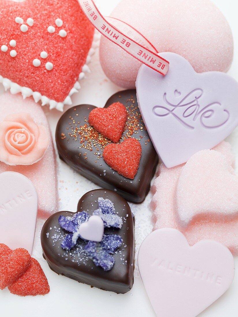 Sugar hearts and heart-shaped chocolate cakes for Valentine's Day