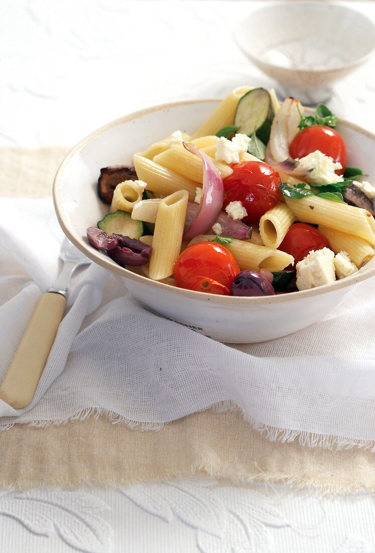 Penne with vegetables and feta