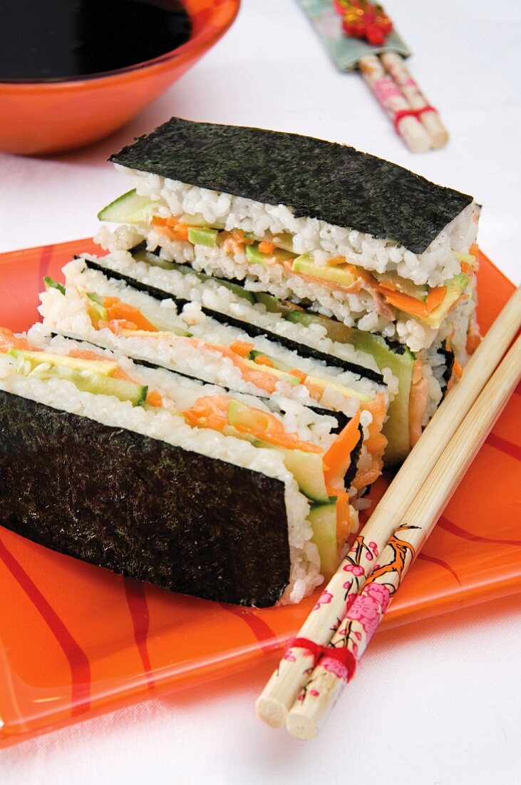 Sushi sandwiches with salmon and vegetable filling