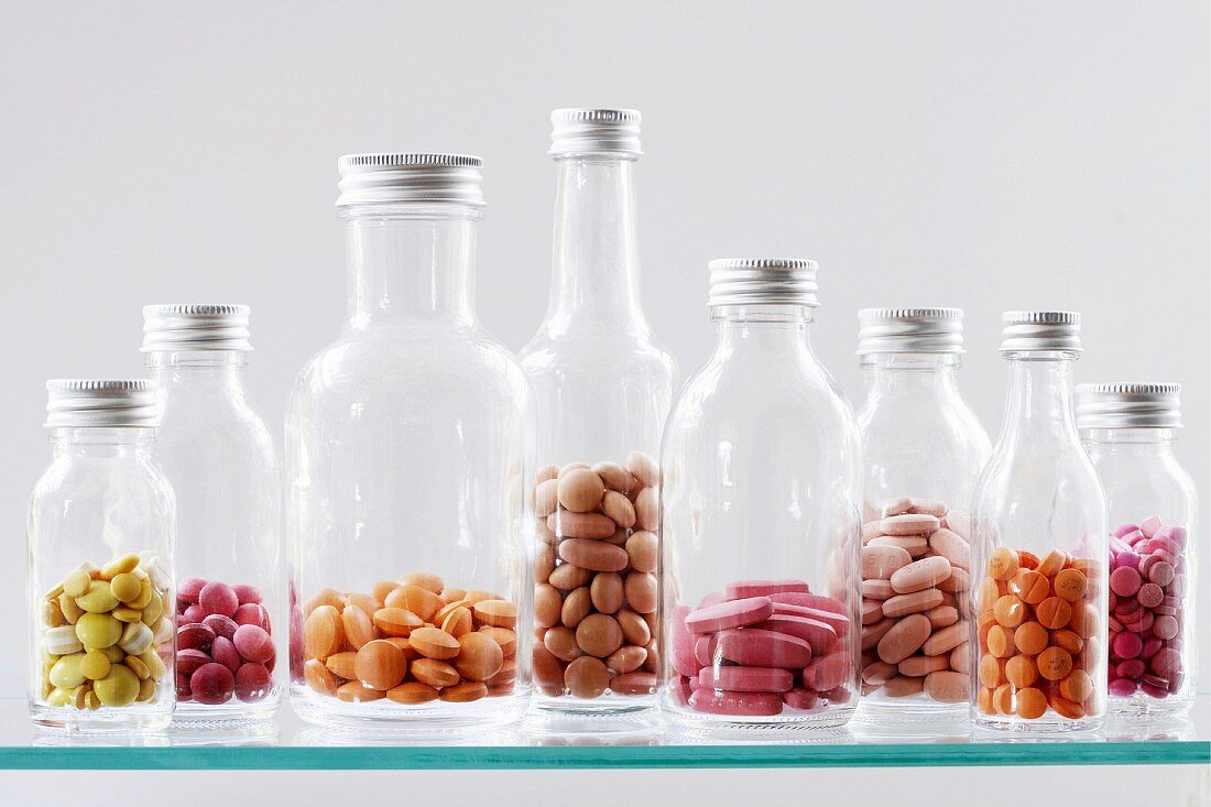 Assorted tablets in bottles
