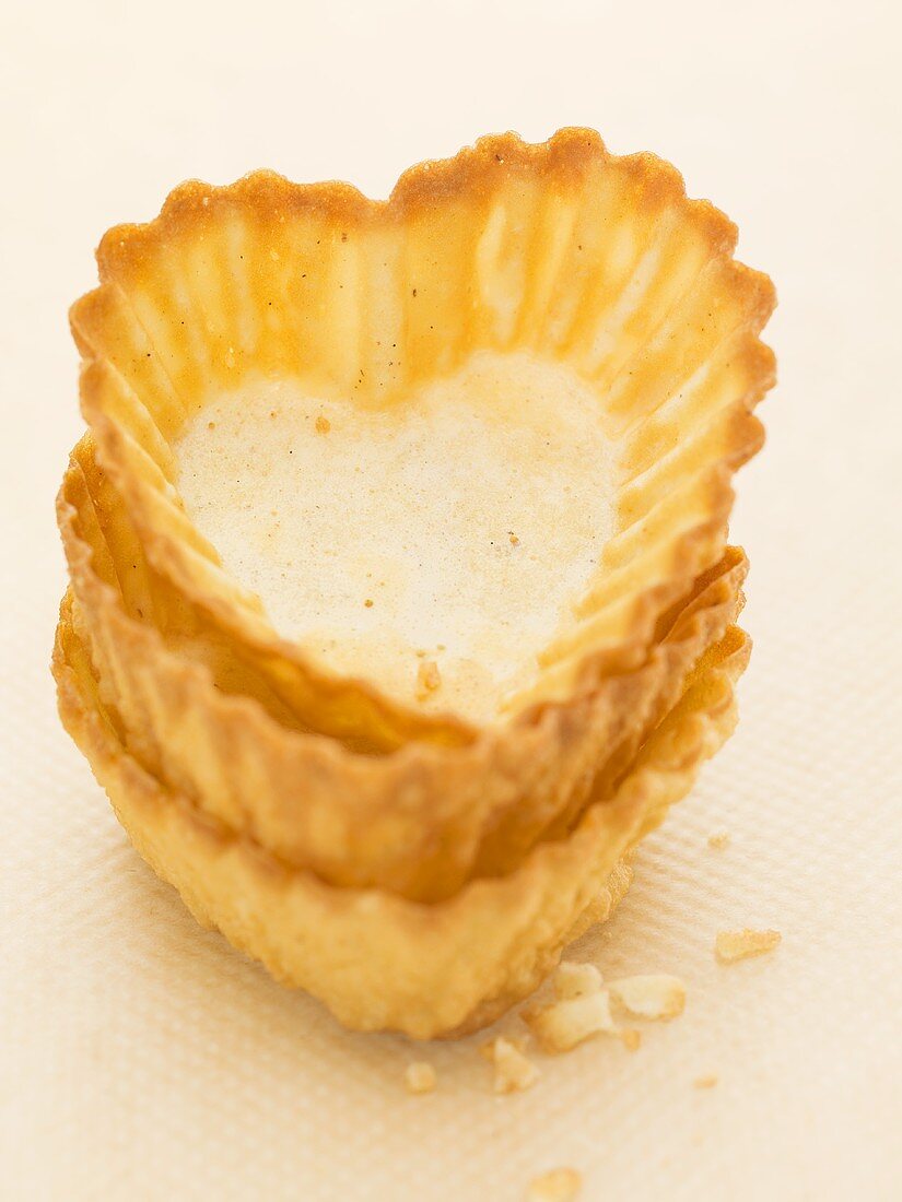 Heart-shaped pastry shells, stacked