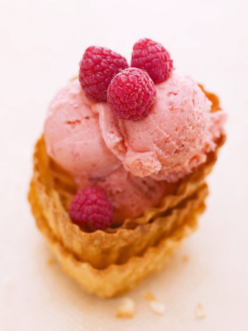 Raspberry ice cream in stacked wafer shells